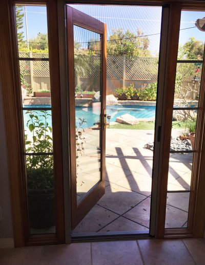 Single Rollaway retractable door in Anodized Grey