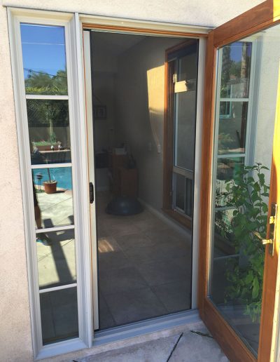 Single Rollaway retractable door in Anodized Grey
