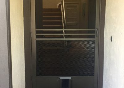 Swinging Screen Door with Pet Door Installed