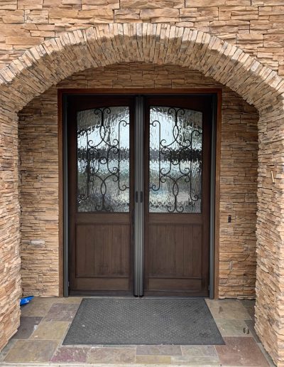 Exterior View of Bronze French Retractable Doors