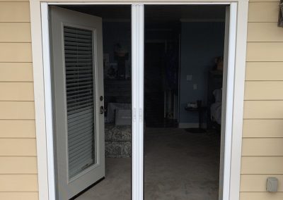 Exterior View of White French Retractables