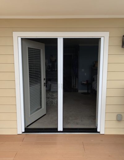 Exterior View of White French Retractables