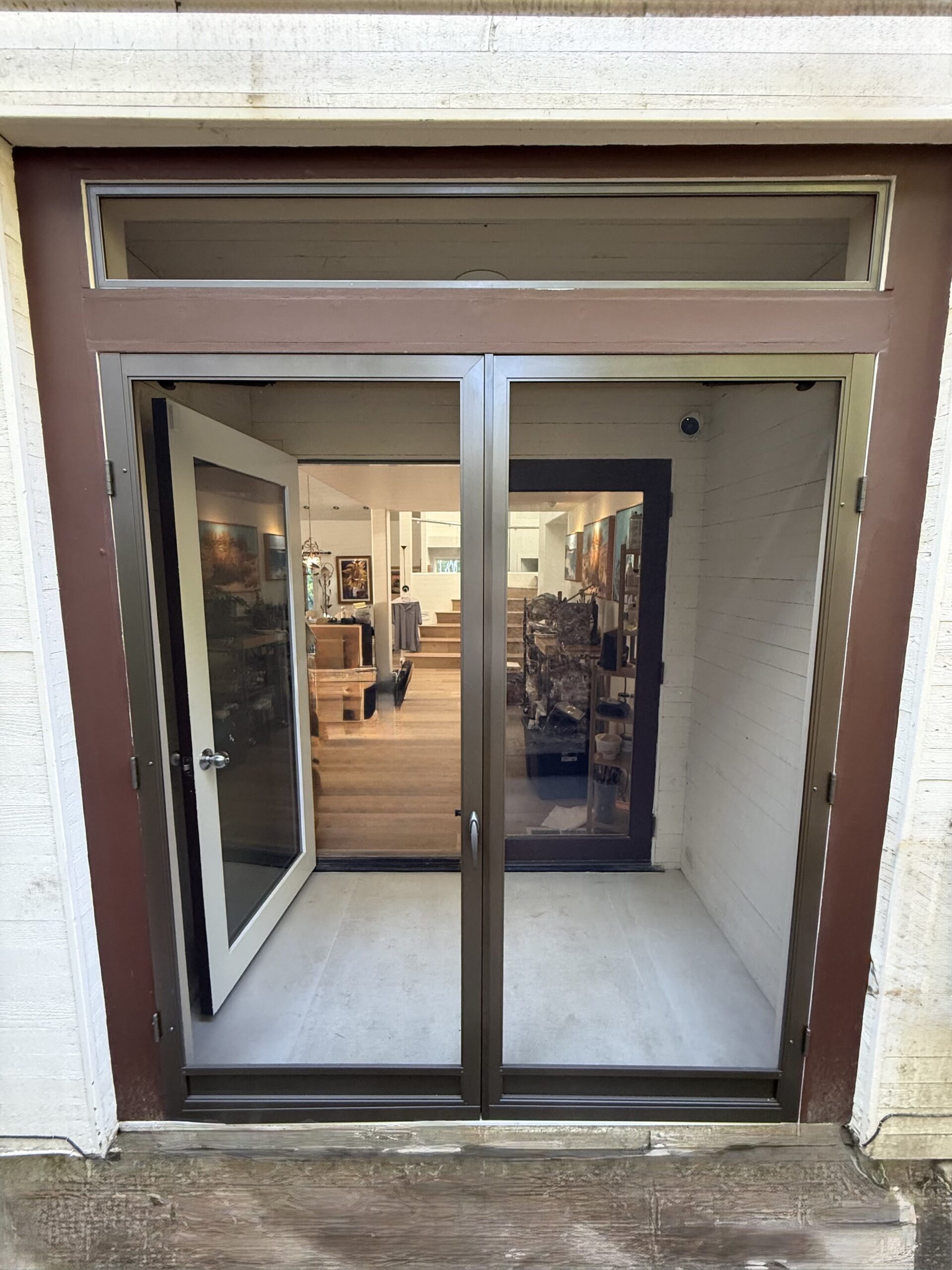Dual swinging Vista screen doors in bronze