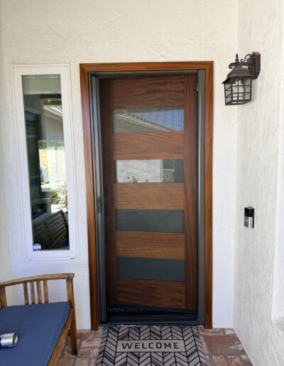 RollAway single retractable screen door in bronze