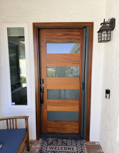 RollAway single retractable screen door in bronze